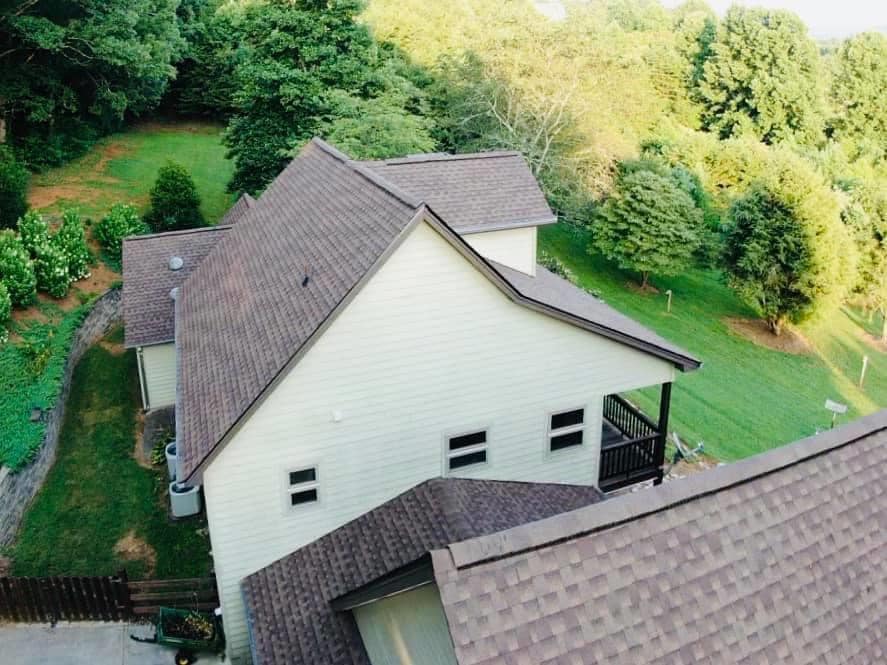 aerial photo of side of home with new roof