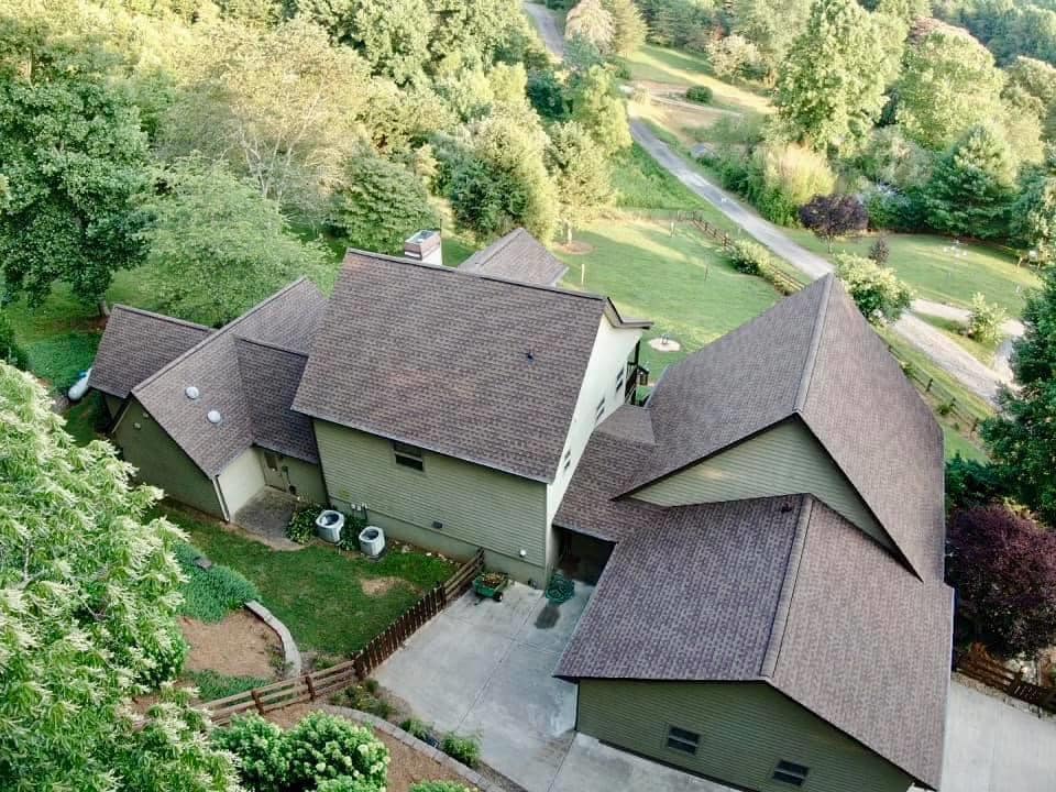 Aerial photo of home that just had a full replacement roof installed.