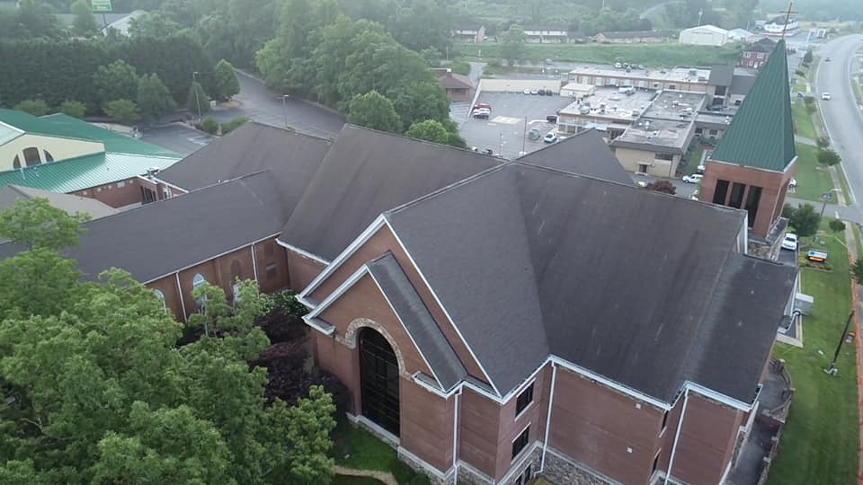 aerial photo of the damaged roof prior to replacement at McConnell Memorial Baptist Church