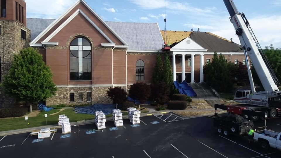 photo of staging area of new roofing materials