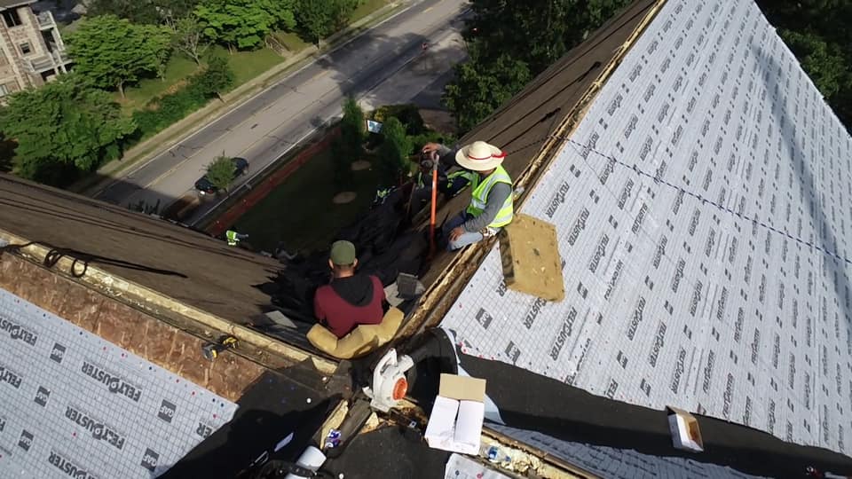 aerial photo of Ridgeline team installing new underlay at the peak