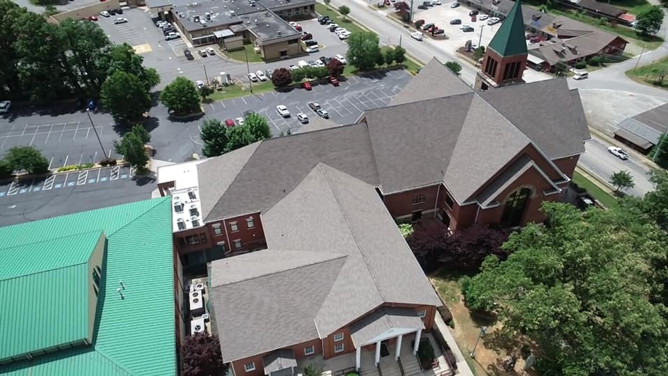 wide aerial view of newly completed roof.