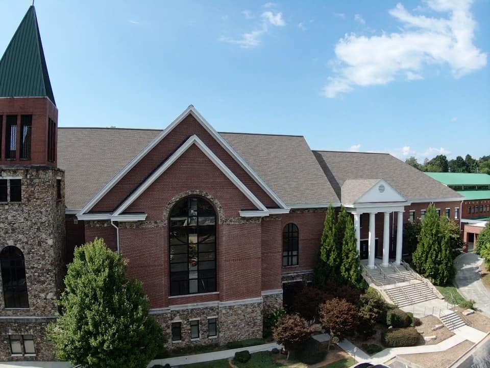 Photo of new roof from front of church and bell tower.