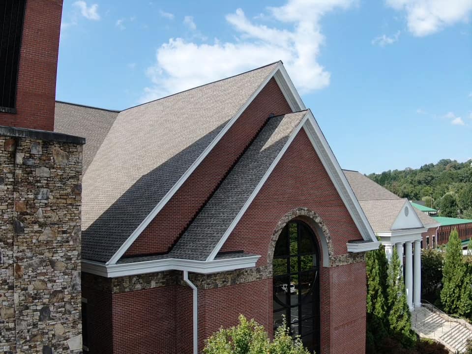 closer view of new roof with double pitch roof dormer over sanctuary window