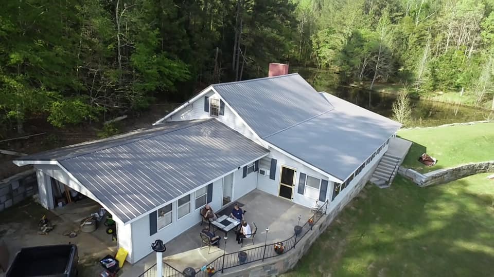 aerial of newly installed metal roof on a residential building