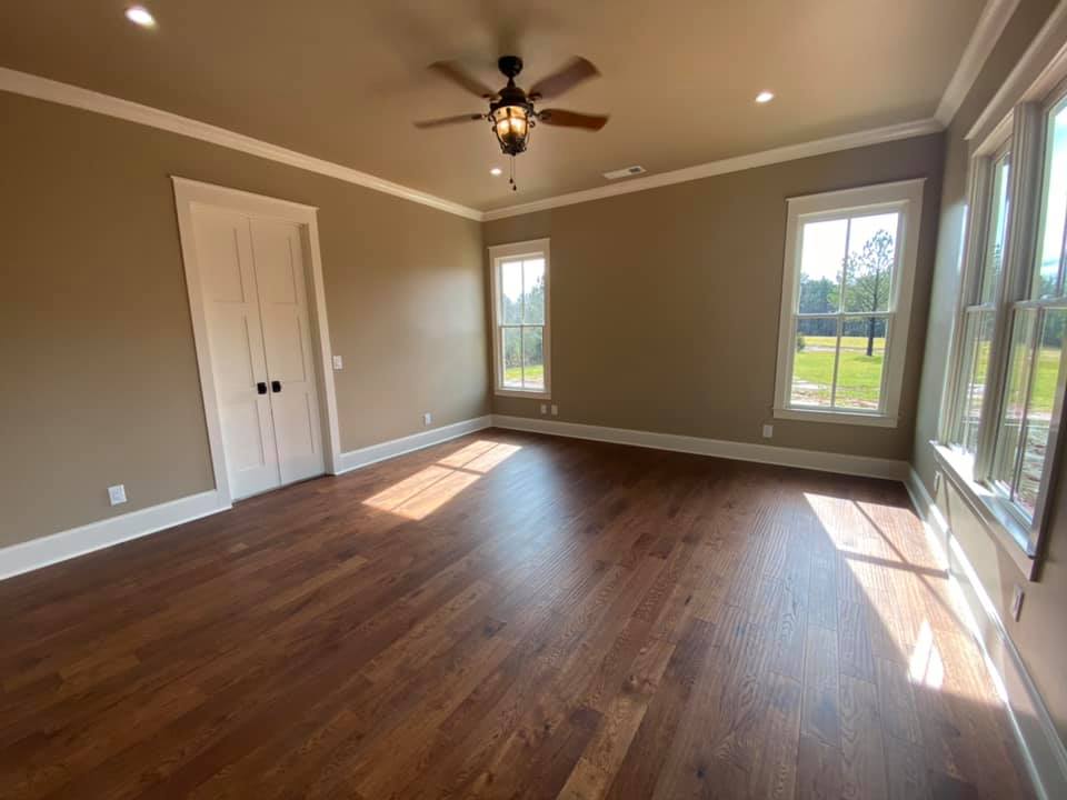 the Boone House bedroom space with large windows