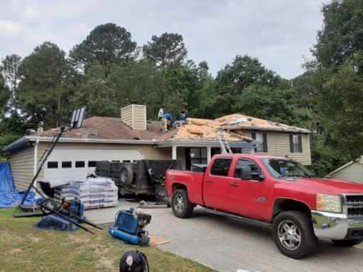 roof undergoing tear off of old roof