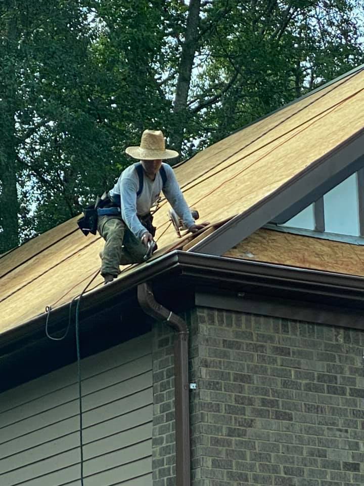 Athens subdivision home with repairs to the broken planks under the roof