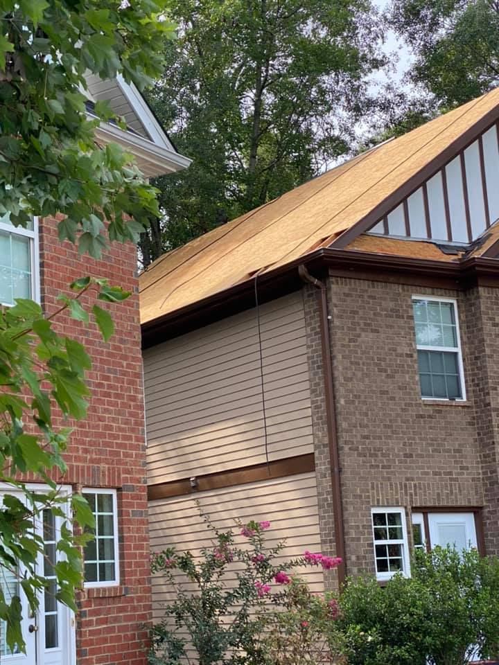 Athens subdivision home with the old roofing removed