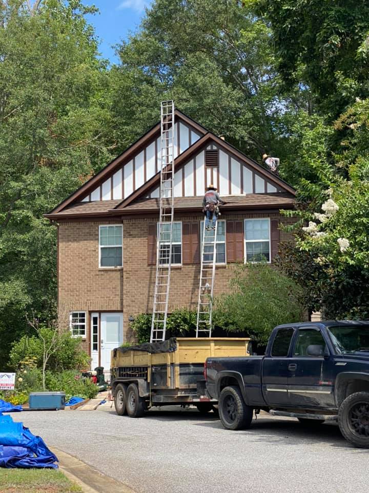 Athens subdivision home with its brand new roof in brown.