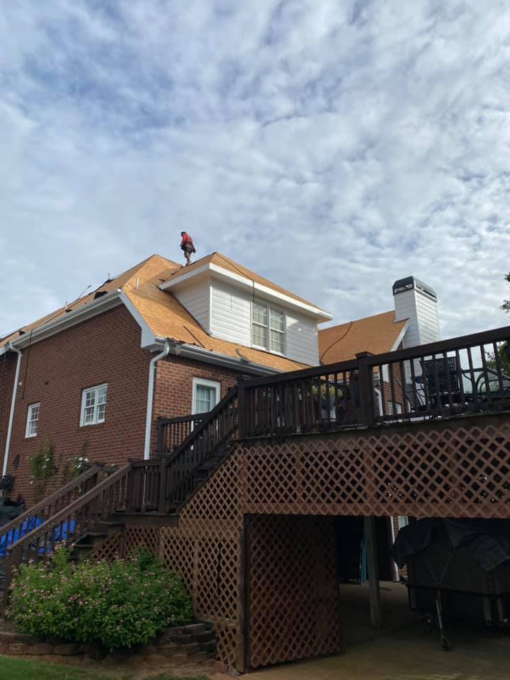 photo of Watkinsville home with workers starting work on the dormers