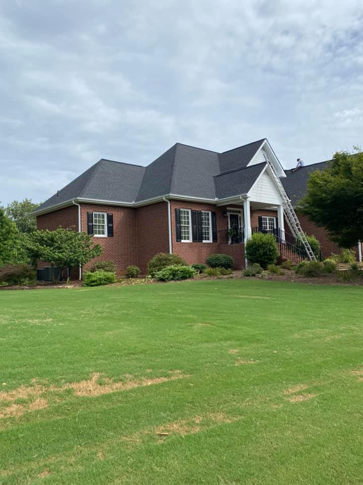 Finished roof at Watkinsville roof from side front of home