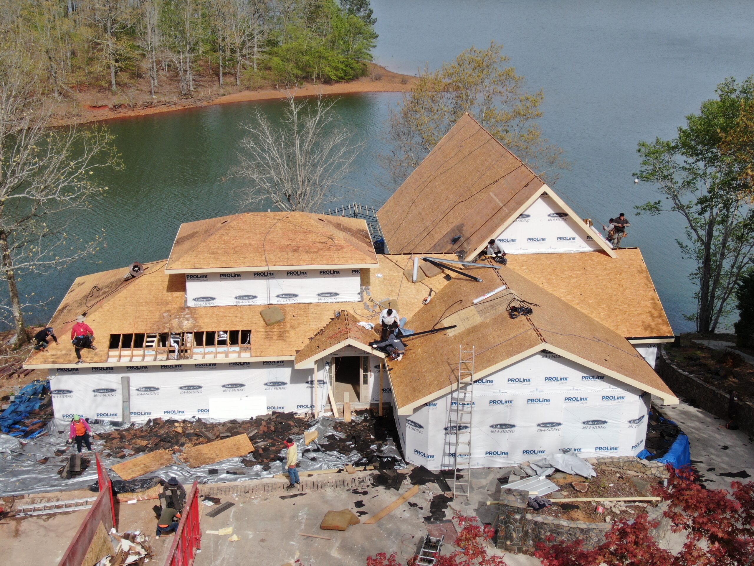 Arial photo of home as new additions get roof