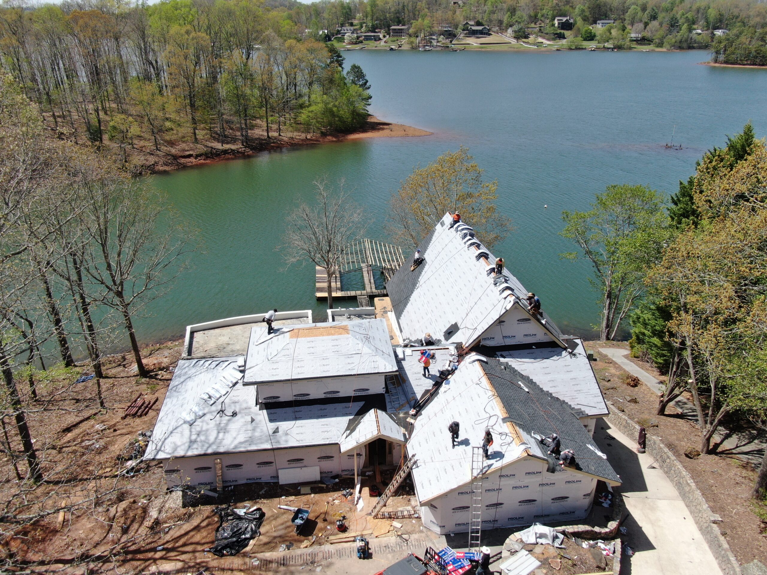 arial photo of home as roof system is installed