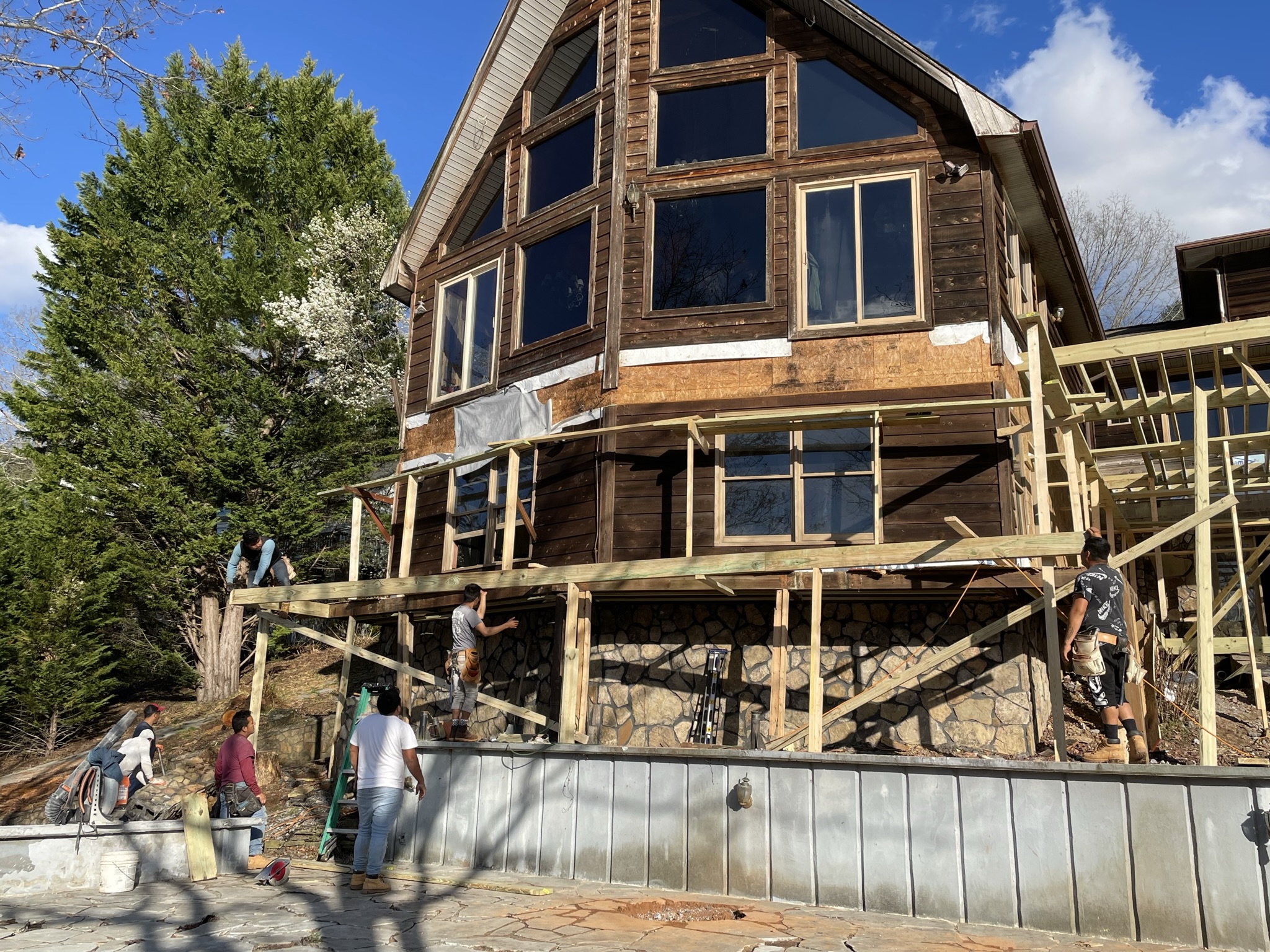 Photo of home under renovation showing the terracing supports for creating structure for decking system