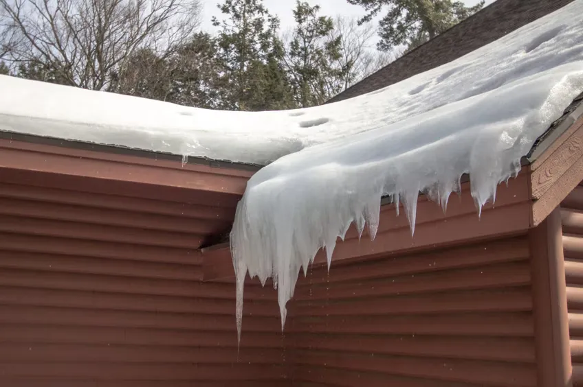 What Is an Ice Dam and How It Damages Your Roof